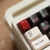 Peach Pink Heart Keycap accenting an ESC key