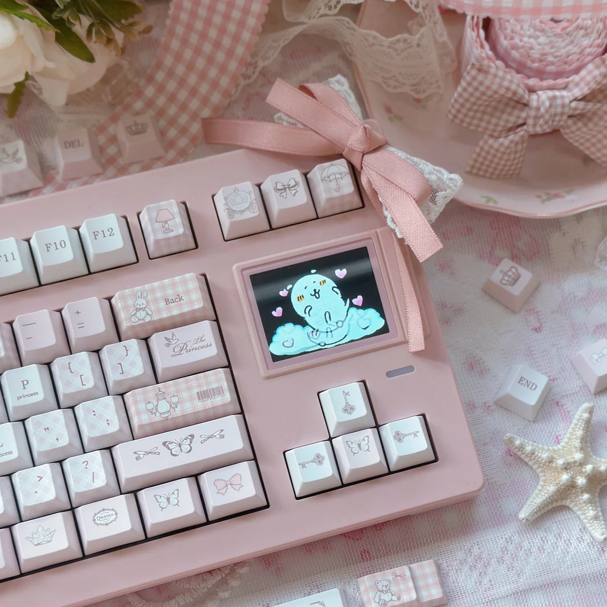 Detail of a specific Love Alarm themed keycap, showing vibrant colors and intricate design.