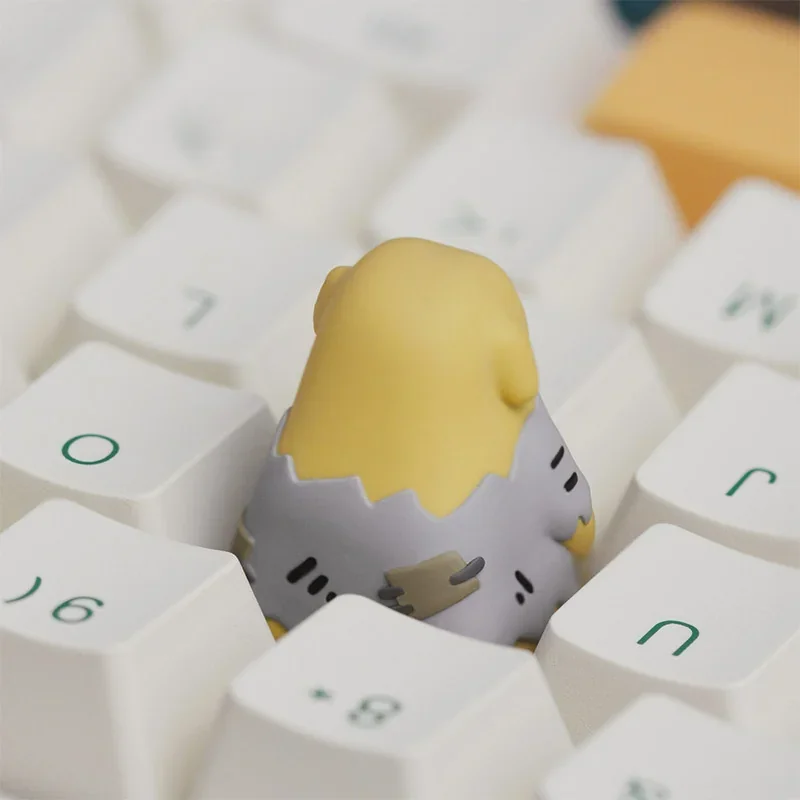 Nudaeng Dog ESC keycap installed on a dark mechanical keyboard, adding a pop of color