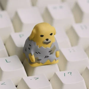 Nudaeng Dog artisan keycap with playful dipping sauce design on a mechanical keyboard