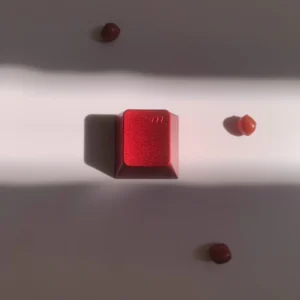 Red Aluminum Artisan Keycap on a mechanical keyboard