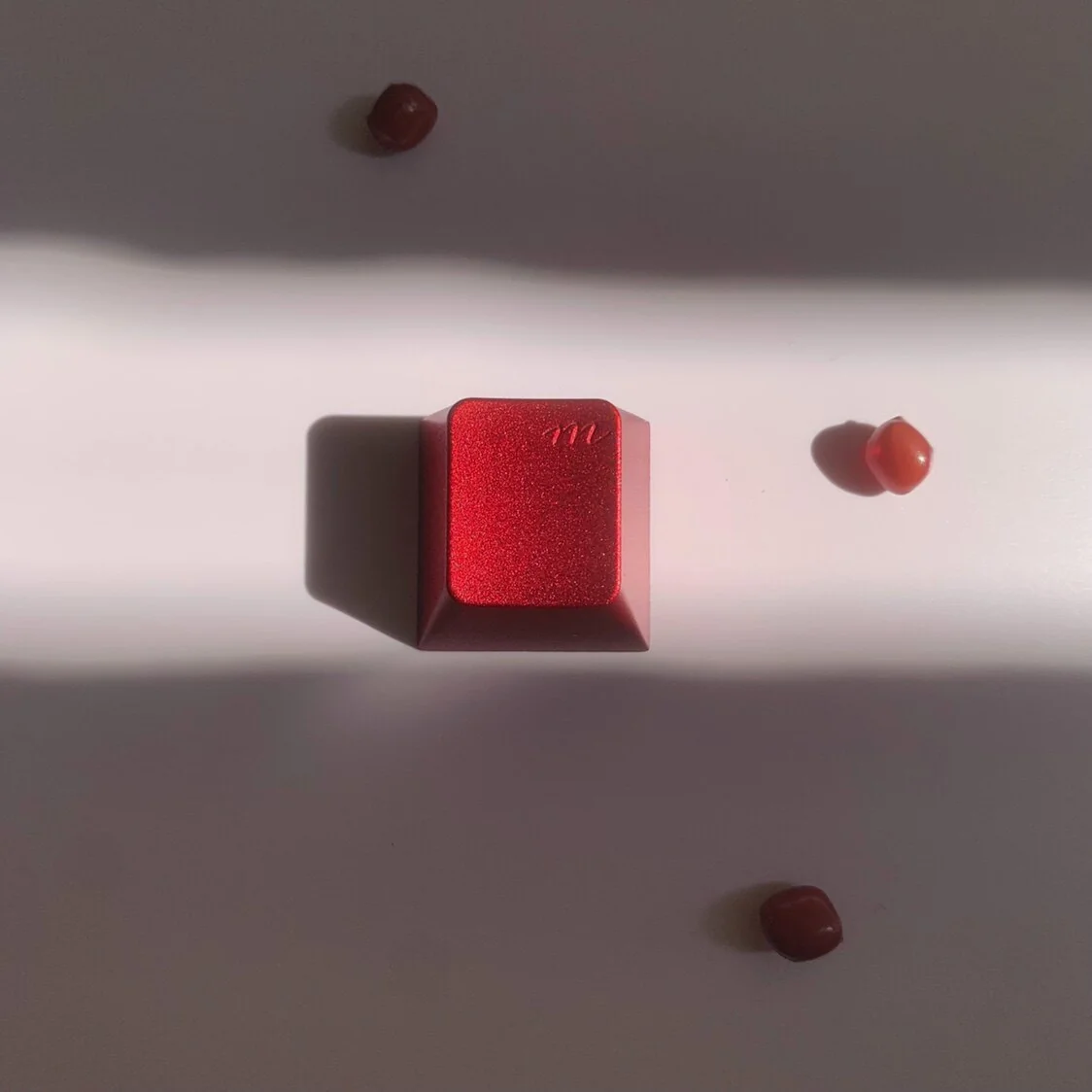 Red Aluminum Artisan Keycap on a mechanical keyboard