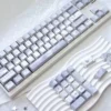 Mechanical keyboard with Butterfly PBT Keycap Set, demonstrating full RGB backlighting effect.