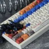 Close-up of battle-worn RX-78-2 Gundam keycap detailing