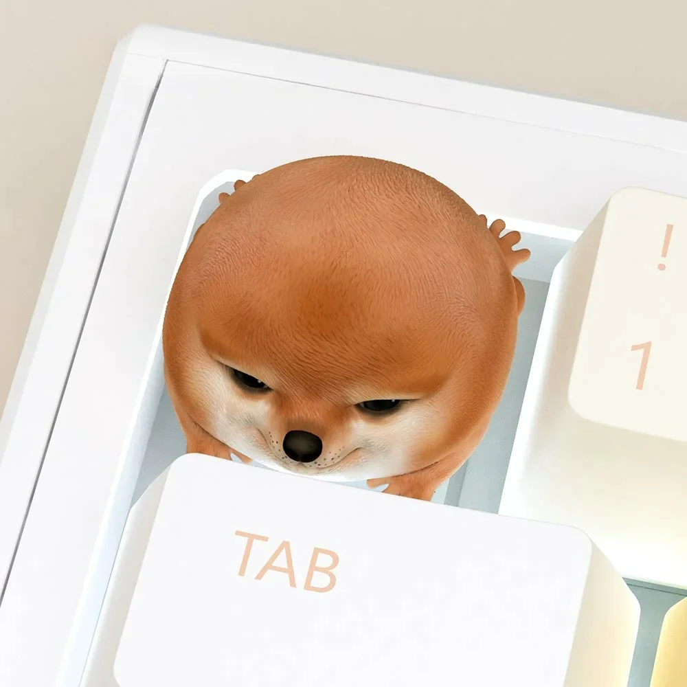 Close-up of the Shiba Inu keycap from a side angle, highlighting the detailed sculpting and painting.