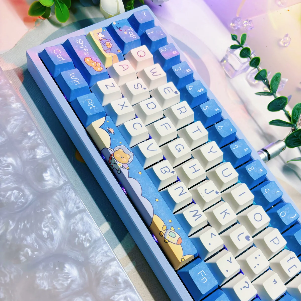 Close-up of Space Bear keycap with dye-sublimated astronaut bear design, showcasing PBT texture