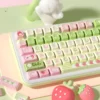 Close-up of Strawberry Milk Rabbit keycaps highlighting dye-sublimated bunny motifs and pastel pinks