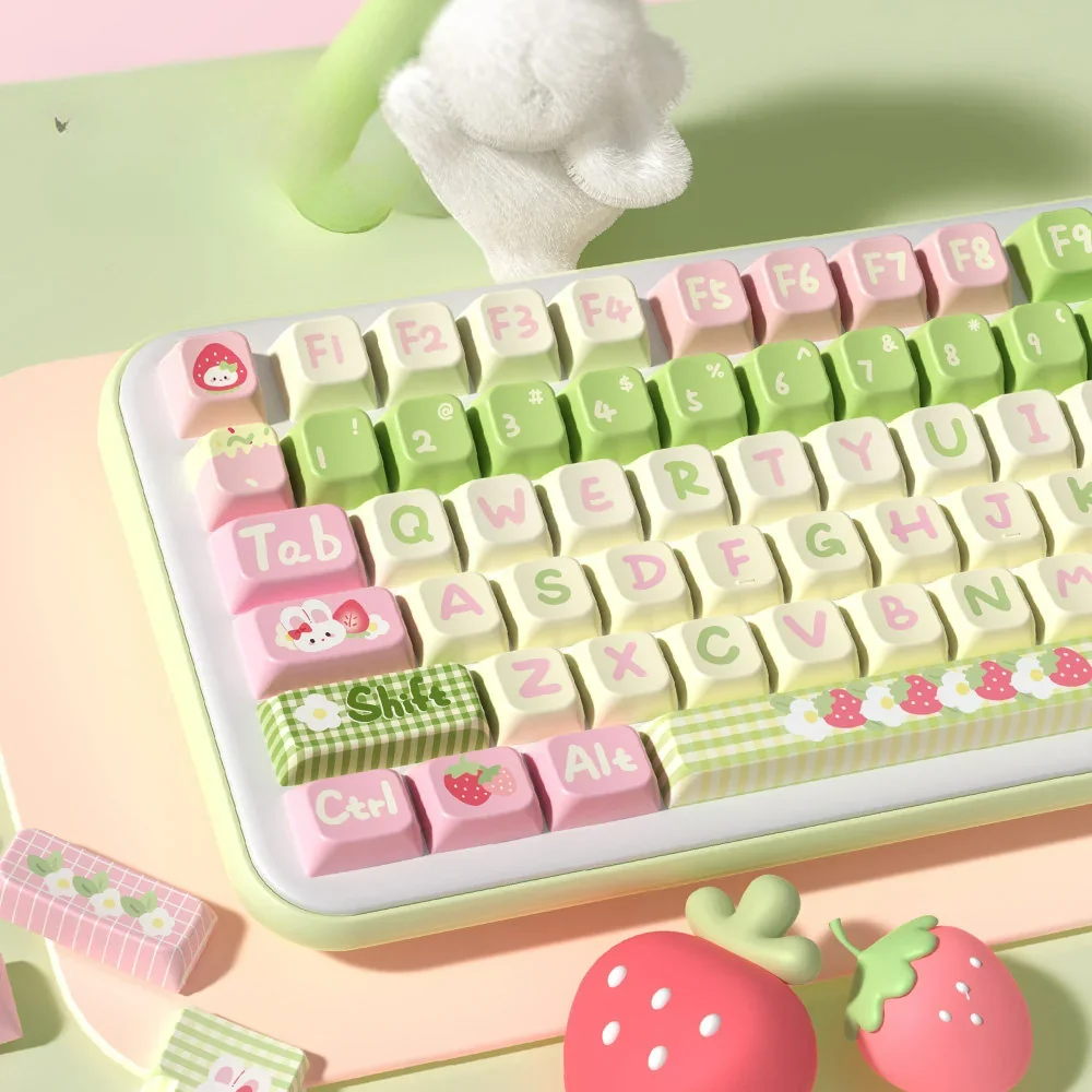 Close-up of Strawberry Milk Rabbit keycaps highlighting dye-sublimated bunny motifs and pastel pinks