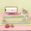 Strawberry Milk Rabbit PBT Keycap Set on a white keyboard, showcasing whimsical design