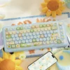 Vibrant Sunflower MOA PBT Keycap Set installed on a mechanical keyboard, showcasing cheerful yellow and green designs.