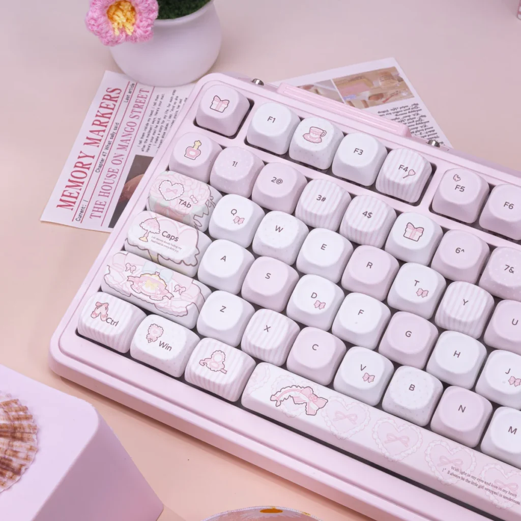 A whimsical keyboard setup featuring the Sweet Milk Candy keycaps, a matching desk mat, and other pastel accessories.