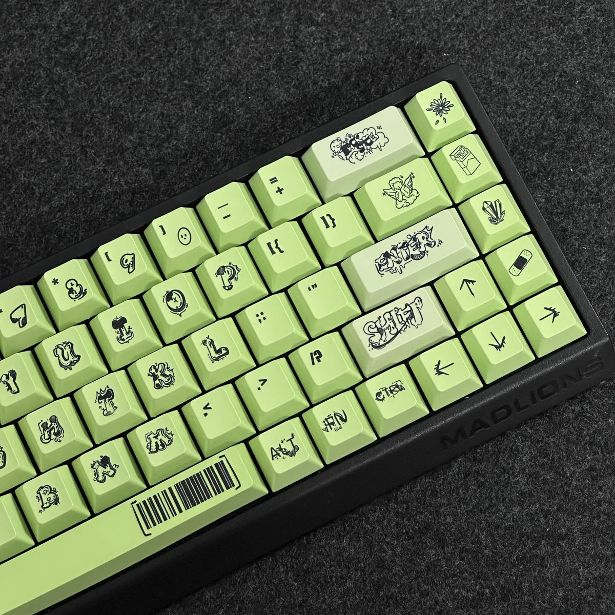 Close-up of vibrant graffiti designs on Cherry profile keycaps