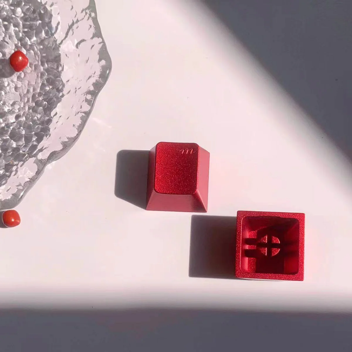Whimsical Red Aluminum Keycap accenting a keyboard setup