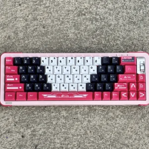Full layout of Arcee PBT Keycap Set with pink, purple, white keys on a mechanical keyboard