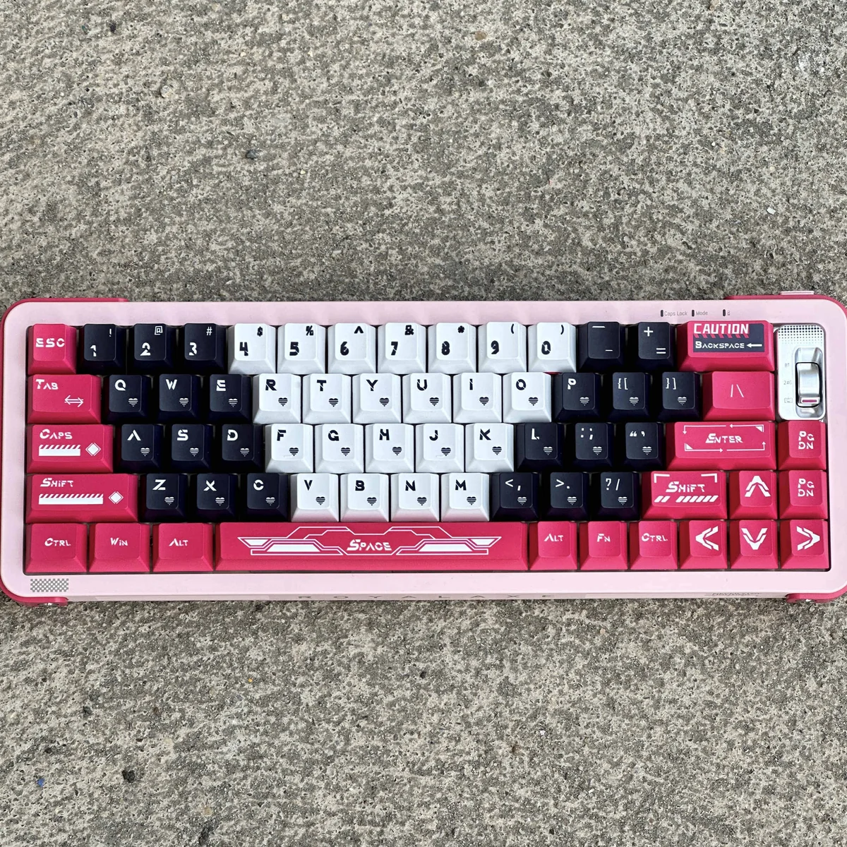 Full layout of Arcee PBT Keycap Set with pink, purple, white keys on a mechanical keyboard