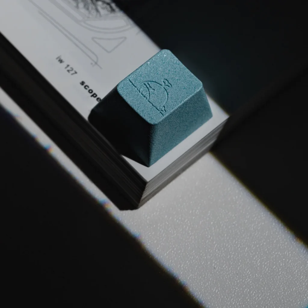 Detailed view of artisan aluminum ESC keycap