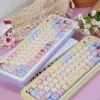 Close-up of Baby Zoraa dye-sub PBT keycaps showcasing pastel colors and cute characters