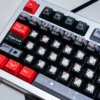 Close-up of Black Armor Bridge keycaps, highlighting dye-sublimated legends and PBT texture.