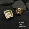 Side view of the Black Myth Wukong keycap, highlighting its Cherry profile and metallic finish