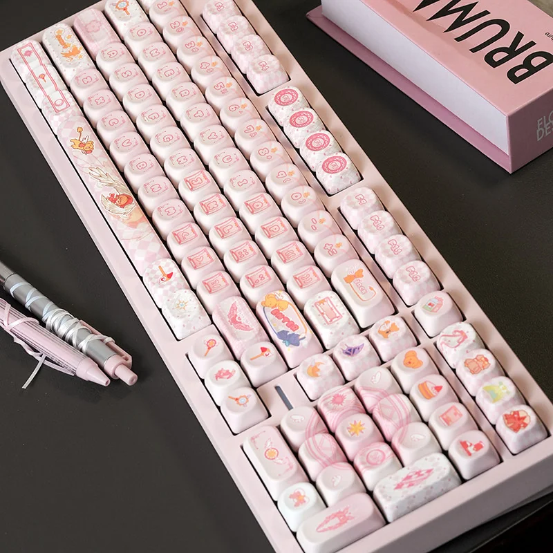 Full layout of Cardcaptor Sakura MOA PBT keycap set on a mechanical keyboard, showcasing pastel colors and magical motifs.