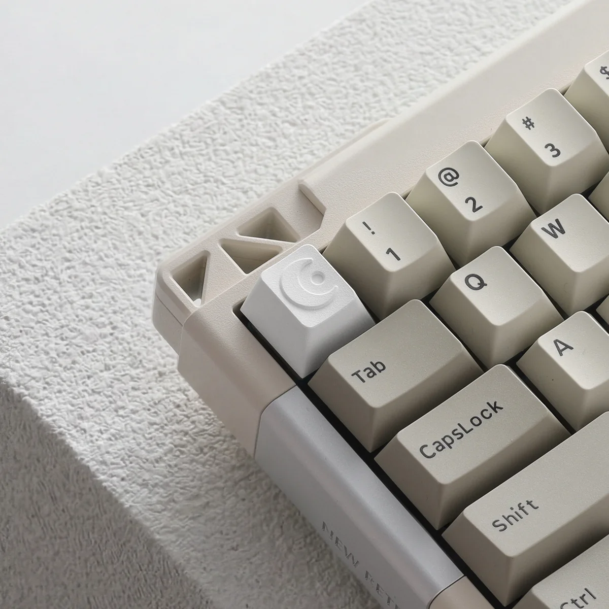 Close-up of the celestial moon design on the ESC keycap