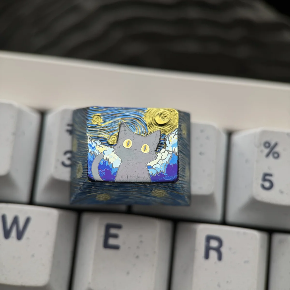 Side view of Cherry profile Mystical Cat keycap, showcasing material texture