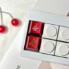 Christmas Tree Snowflake CNC Aluminum Keycap on a mechanical keyboard with festive lighting