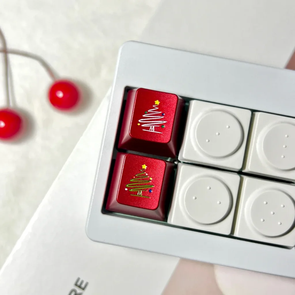 Christmas Tree Snowflake CNC Aluminum Keycap on a mechanical keyboard with festive lighting