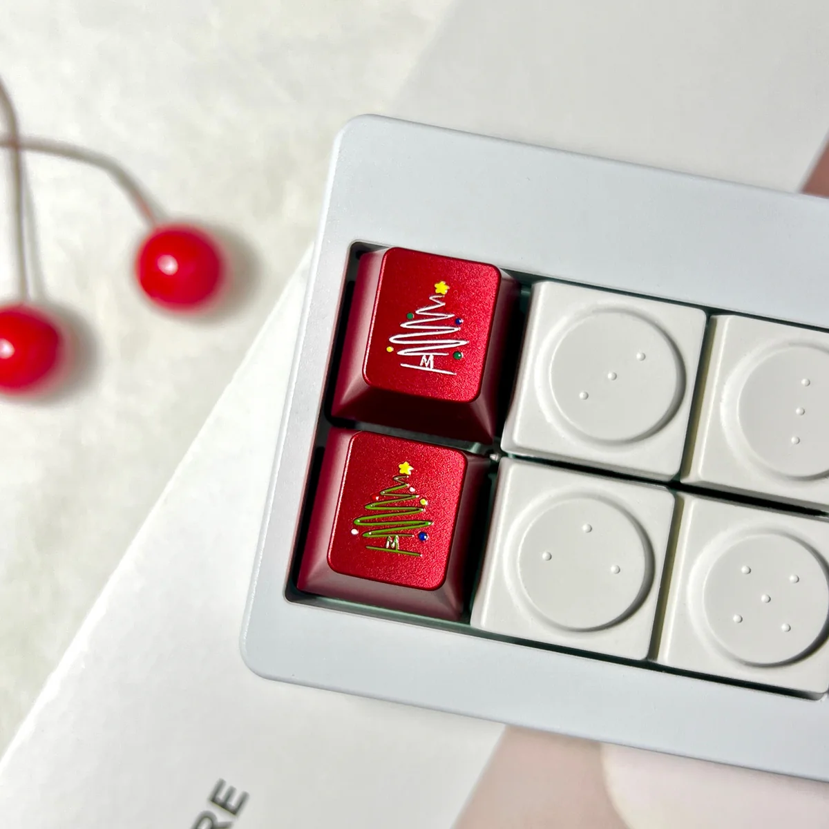 Christmas Tree Snowflake CNC Aluminum Keycap on a mechanical keyboard with festive lighting