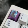 Detailed view of Columbina's intricate design on a titanium keycap