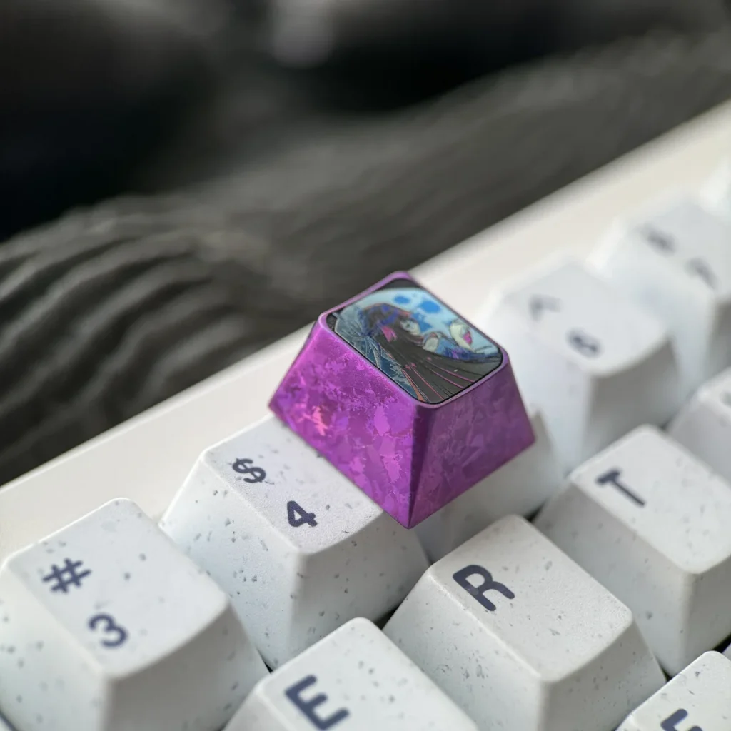 Texture and metallic sheen of the Columbina Titanium Artisan Keycap