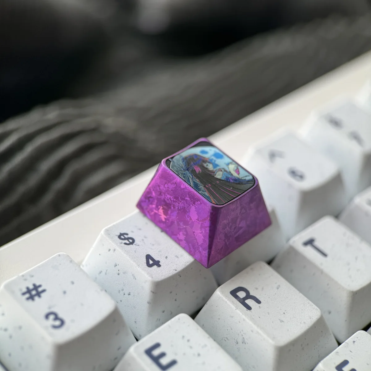 Texture and metallic sheen of the Columbina Titanium Artisan Keycap