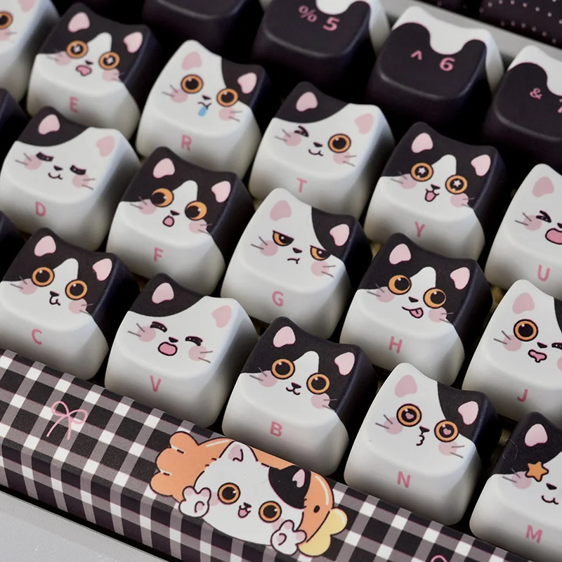 Overhead view of the 129-key Cow Cat keycap set layout, highlighting full compatibility