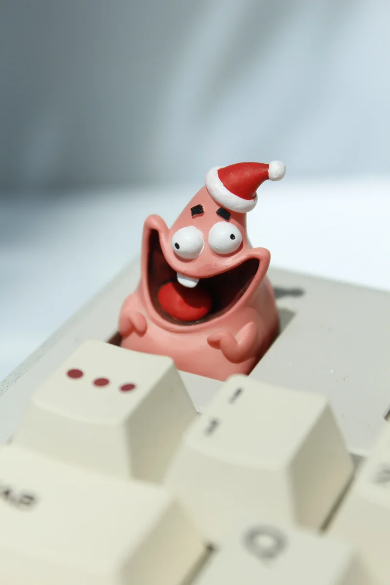 Ergonomic view of Patrick Star keycap fitting an MX mechanical switch