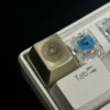 Eye of Horus Keycap in white copper and brass material options