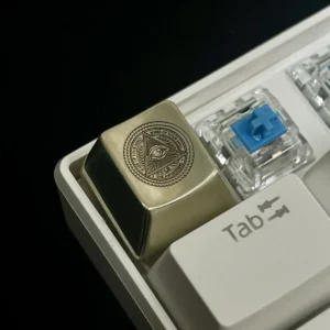 Eye of Horus Keycap in white copper and brass material options