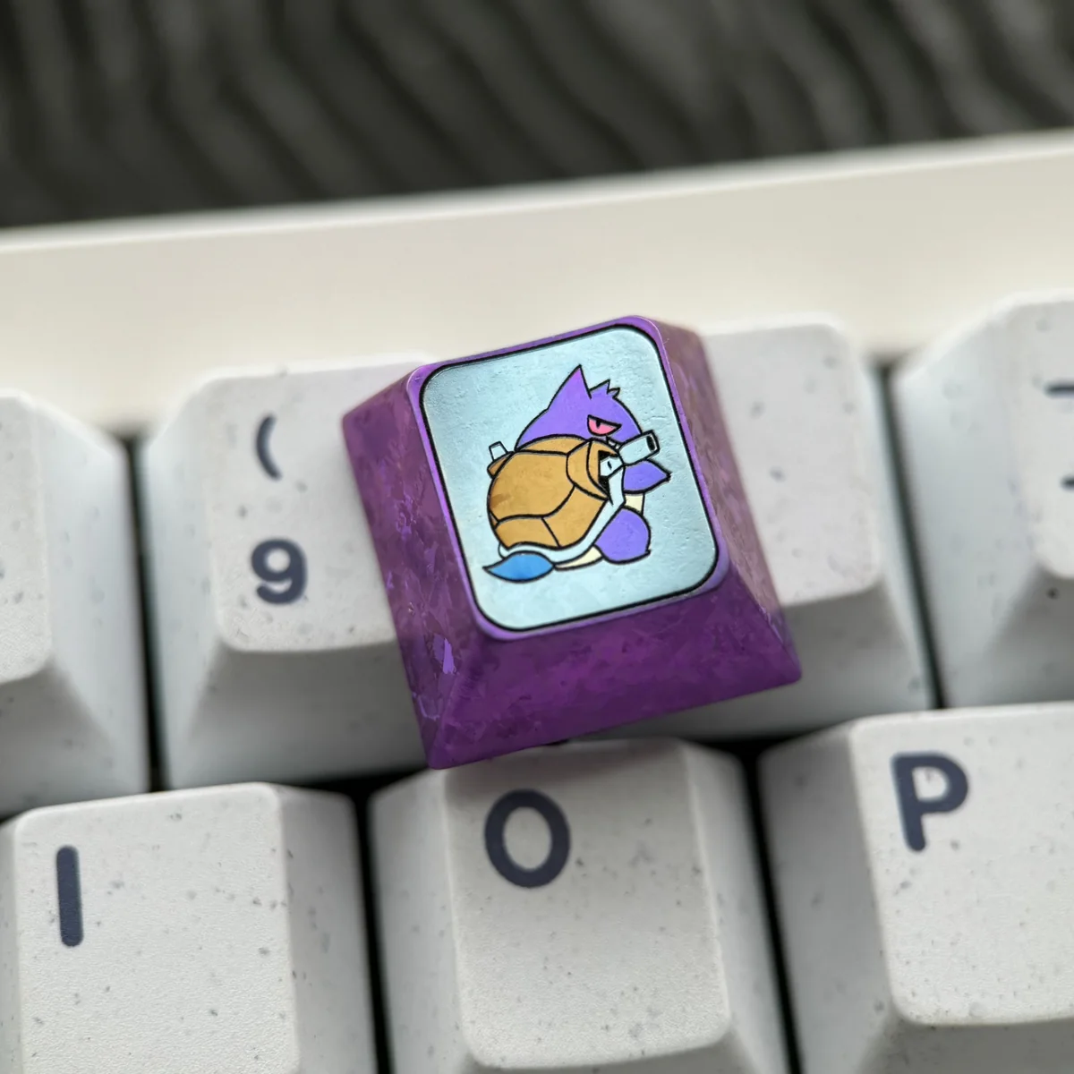 Detailed shot of the Gengar keycap's base, showing MX stem compatibility and robust construction.