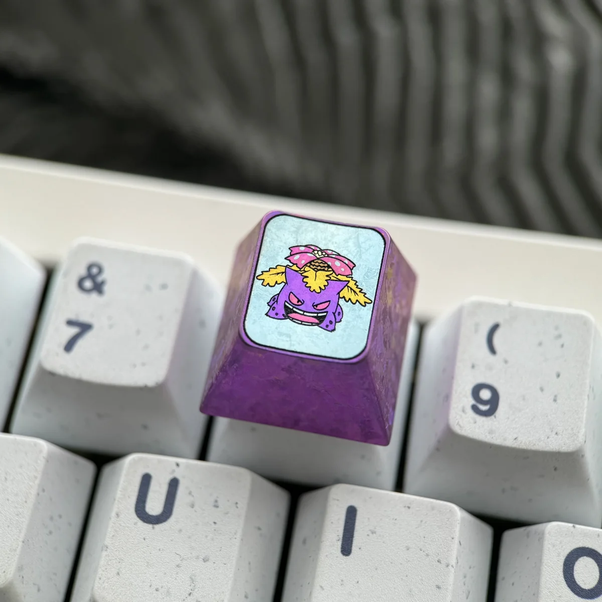 Gengar Titanium Keycap integrated into a mechanical keyboard setup, adding a unique, mischievous accent.