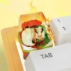 Flareon keycap glowing fiery orange on keyboard