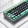 Close-up of side-engraved legends on Heisenberg keycaps, glowing subtly