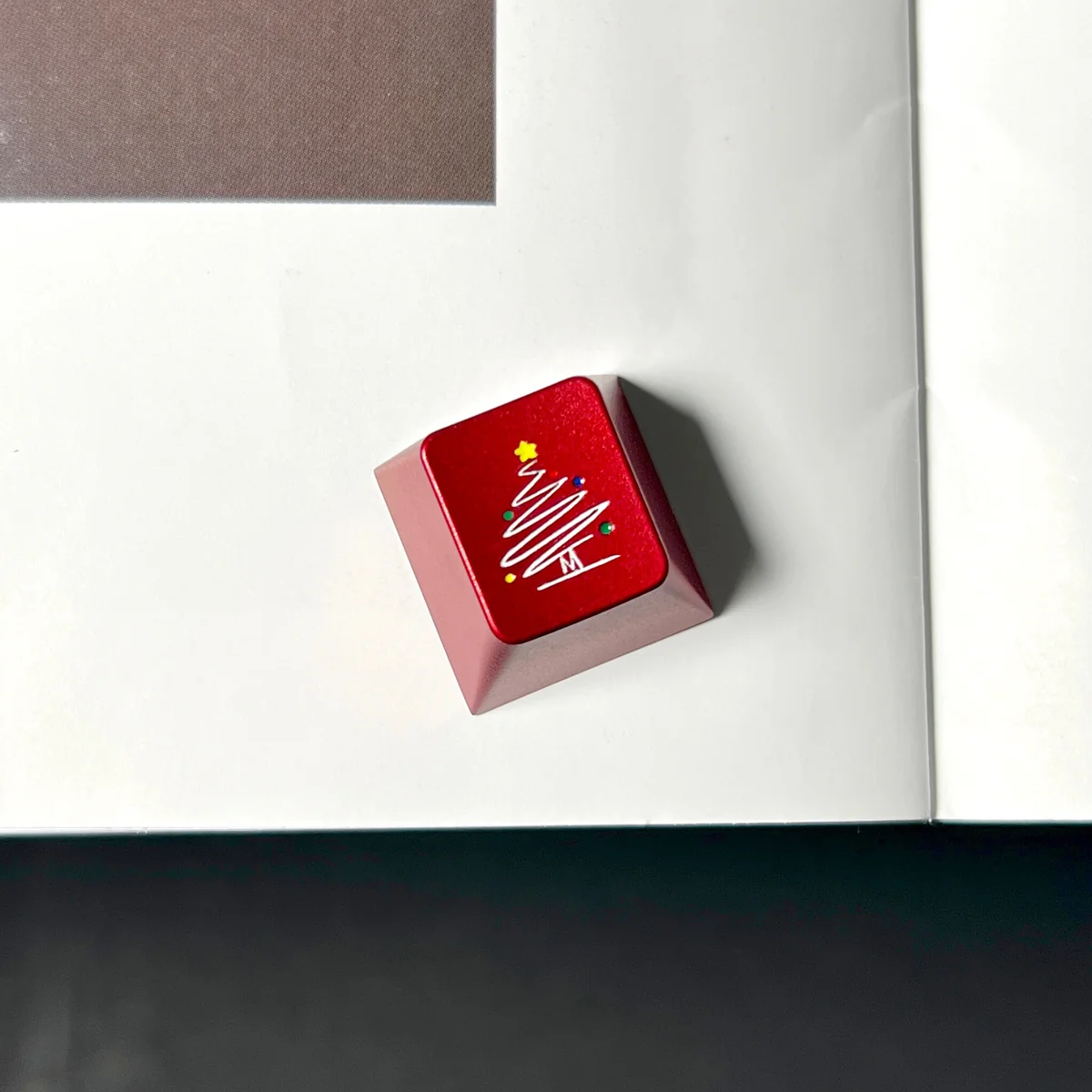 Premium CNC Aluminum ESC keycap with a festive holiday theme, showcasing its durable finish