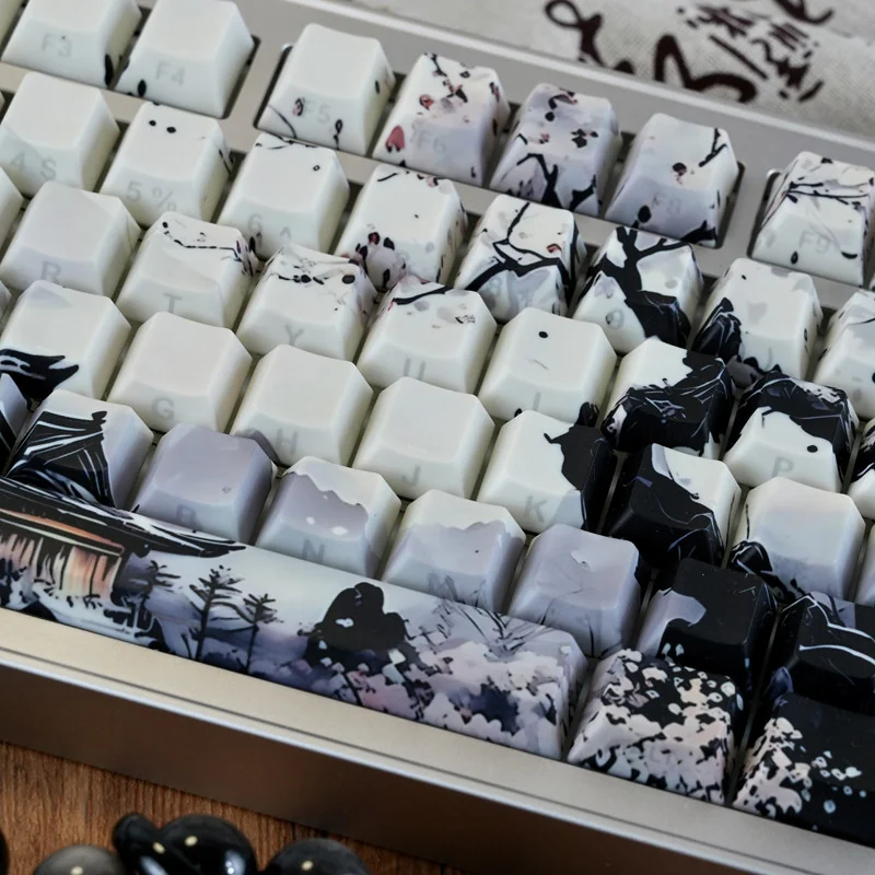 Backlit Ice Core keycaps glowing with ethereal light from side-engraved legends