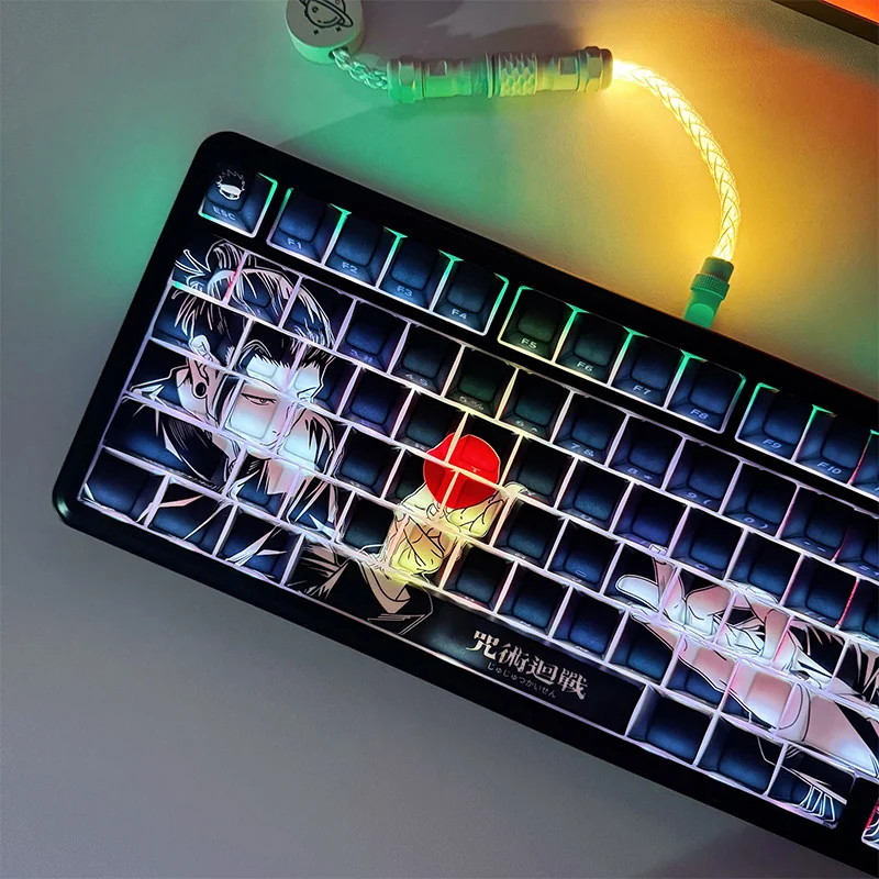 Close-up of side-printed Gojo and Geto anime keycaps