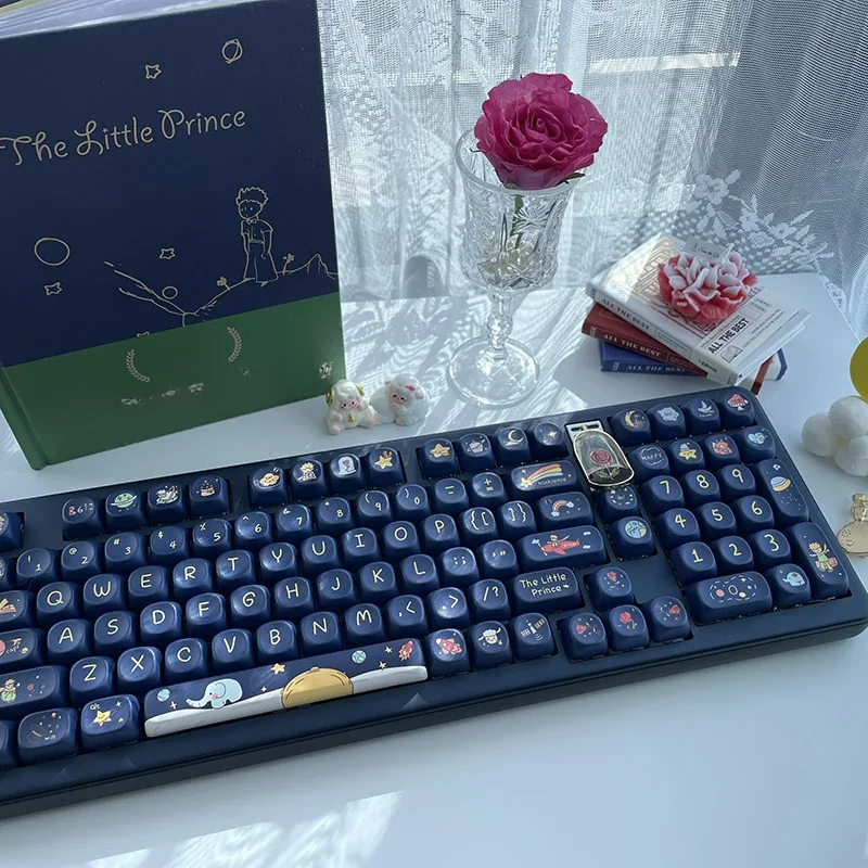 Le Petit Prince Keycap Set with MOA profile on a white keyboard, showcasing whimsical art.