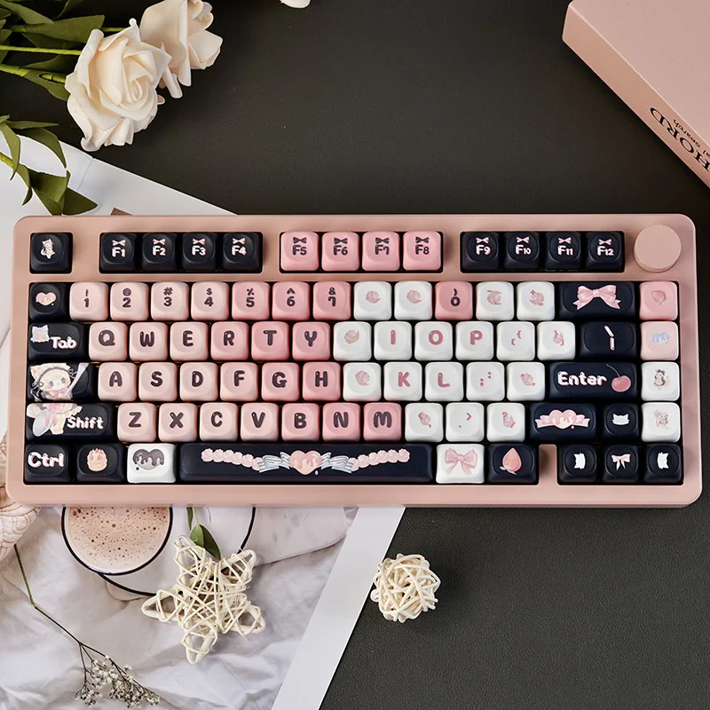 Maid Cat PBT Keycap Set in black and pink on a mechanical keyboard