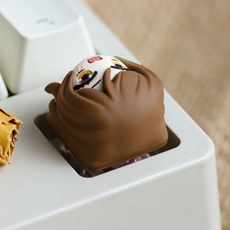 Close-up of Nanami Momozono resin keycap, showcasing intricate handcrafted details and vibrant colors.