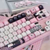 Close-up of Naughty Cat keycaps showing dye-sublimated legends and smooth texture