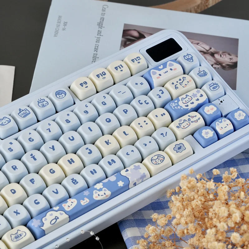 PBT Sea Salt Cat keycaps arranged in a calming blue color palette.