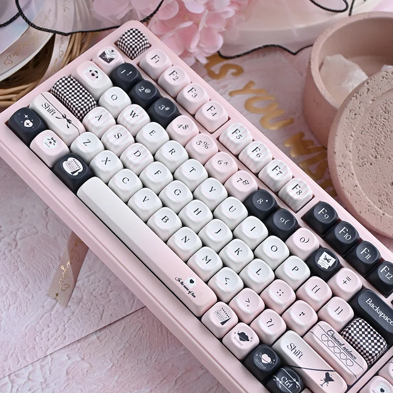 Original Sin MOA Keycap Set featuring black and pink dye-sub legends on a mechanical keyboard.