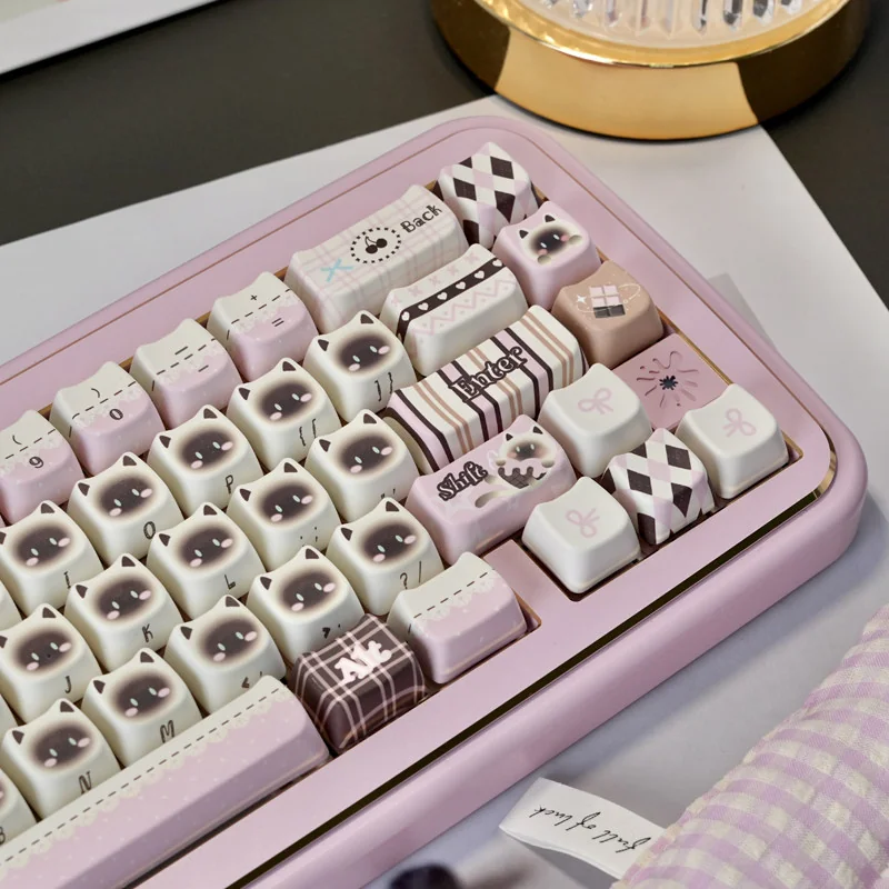 Side profile of the Pink Siamese Cat keycaps, demonstrating their ergonomic shape and PBT texture.